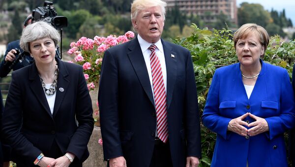  Theresa May, Donald Trump et Angela Merkel - Sputnik Afrique
