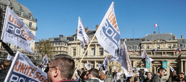 Des drapeaux de l'unité SGP Police, le 25 septembre 2018 - Sputnik Afrique