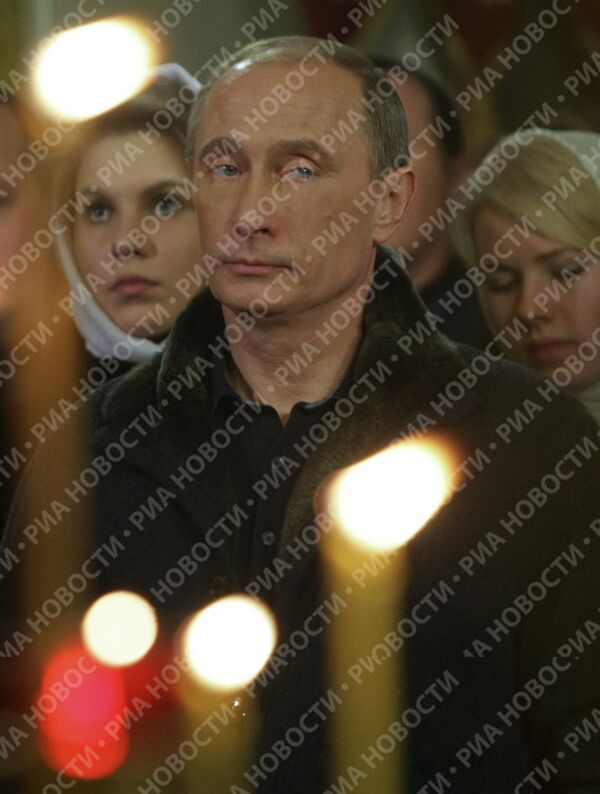 Poutine pendant un office de Noël à Kostroma - Sputnik Afrique