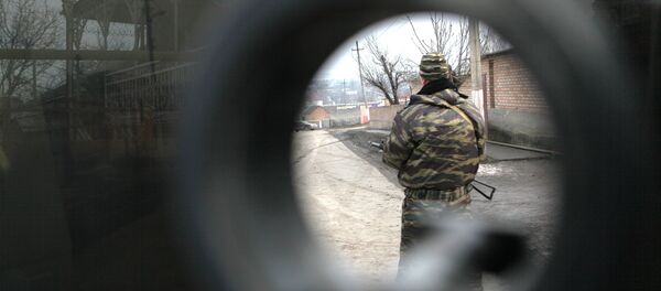 Un homme armé Un homme armé - Sputnik Afrique