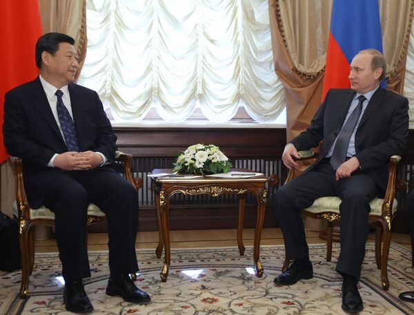 Le vice-président chinois Xi Jinping au cours de son entretien avec le premier ministre russe Vladimir Poutine - Sputnik Afrique