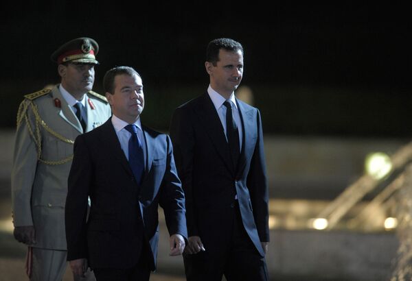 Les présidents russe et syrien Dmitri Medvedev et Bachar Assad - Sputnik Afrique