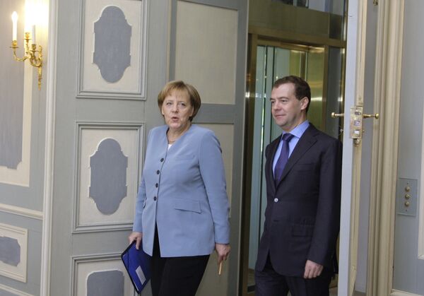 La chancelière fédérale Angela Merkel et le président russe Dmitri Medvedev - Sputnik Afrique