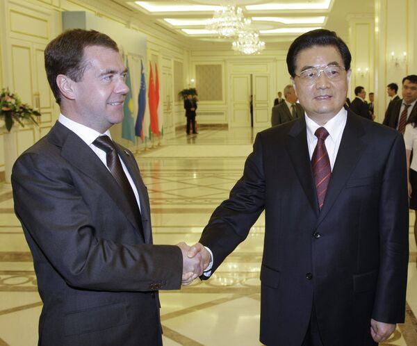 Le président russe Dmitri Medvedev et le chef de l'Etat chinois Hu Jintao - Sputnik Afrique