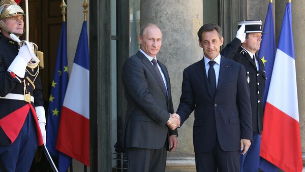 Le premier ministre russe Vladimir Poutine et le président français Nicolas Sarkozy - Sputnik Afrique