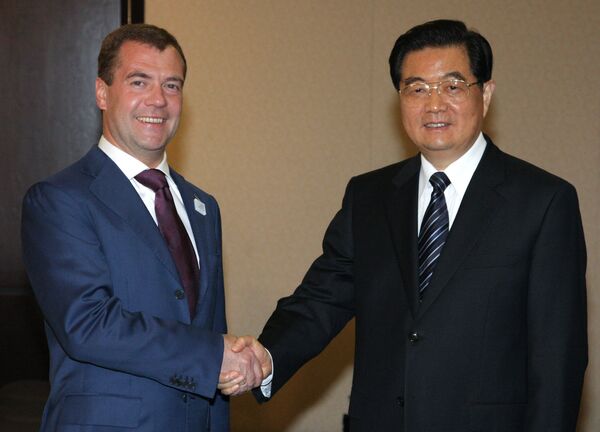 Le président russe Dmitri Medvedev et le président chinois Hu Jintao - Sputnik Afrique
