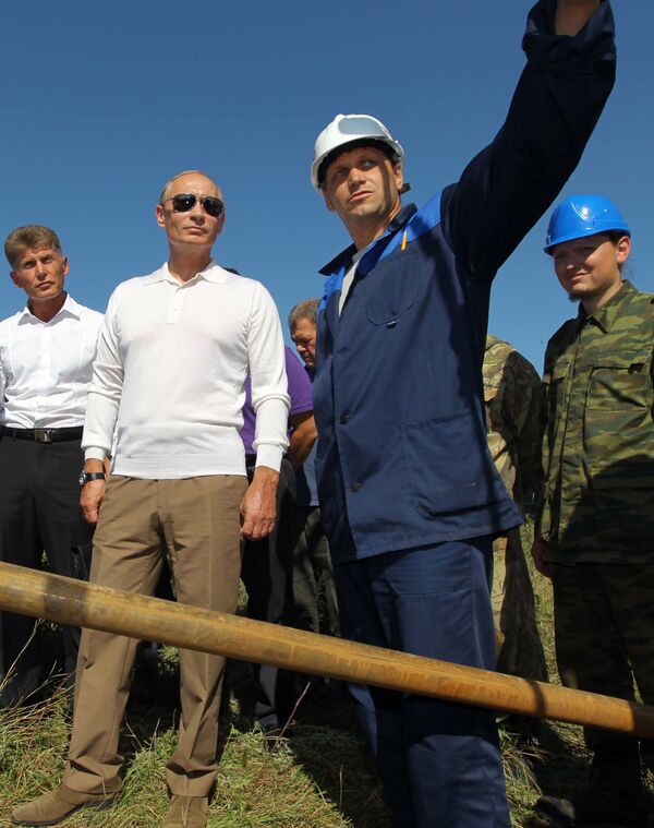 Vladimir Poutine au chantier du cosmodrome Vostotchny - Sputnik Afrique