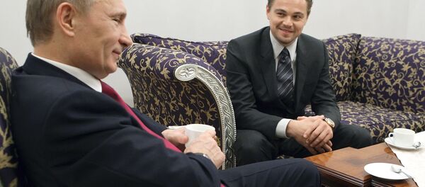 Vladimir Poutine rencontre Leonardo DiCaprio à Saint-Pétersbourg - Sputnik Afrique