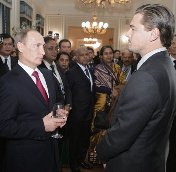 Vladimir Poutine rencontre Leonardo DiCaprio à Saint-Pétersbourg - Sputnik Afrique