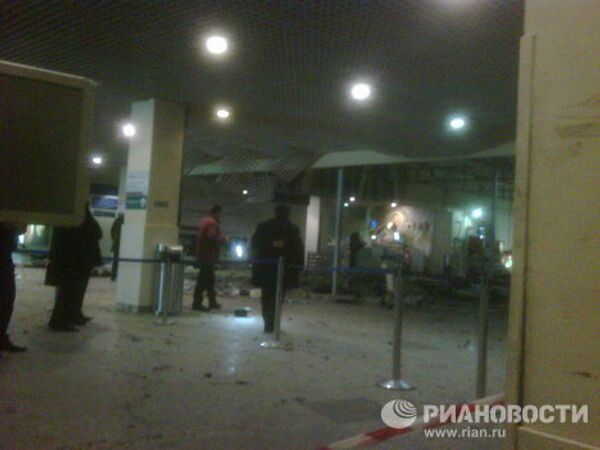 Attentat contre l'aéroport de Moscou: chaos, douleur et condoléances - Sputnik Afrique