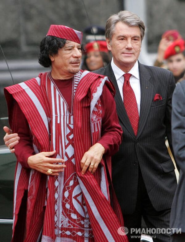 Les tenue chatoyantes de Mouammar Kadhafi - Sputnik Afrique