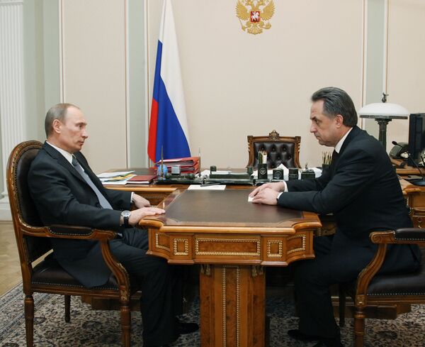 Vladimir Poutine lors d'une rencontre avec le ministre russe des Sports Vitali Moutko - Sputnik Afrique