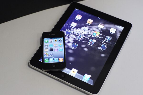 Apple iPhone et Apple iPad - Sputnik Afrique