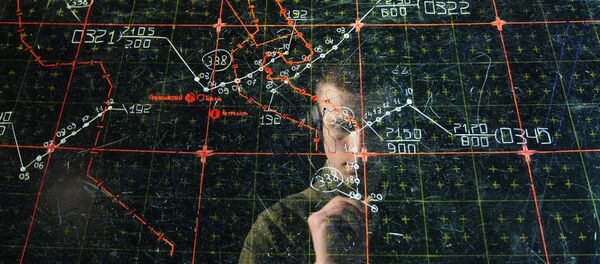 Un militaire de permanence au poste de commandement Un militaire de permanence au poste de commandement - Sputnik Afrique