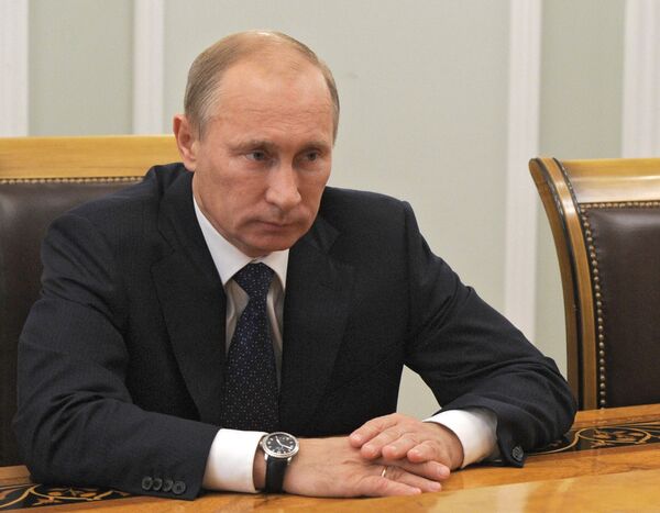 Premier ministre et candidat au Kremlin Vladimir Poutine - Sputnik Afrique