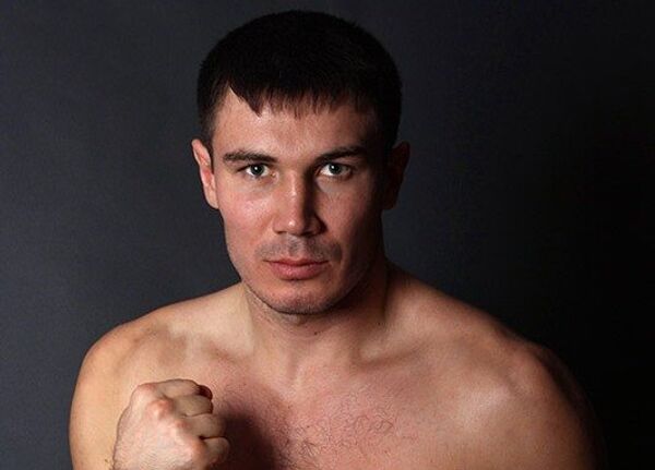 Le champion d'Asie et de Russie des poids mi-lourds Roman Simakov - Sputnik Afrique