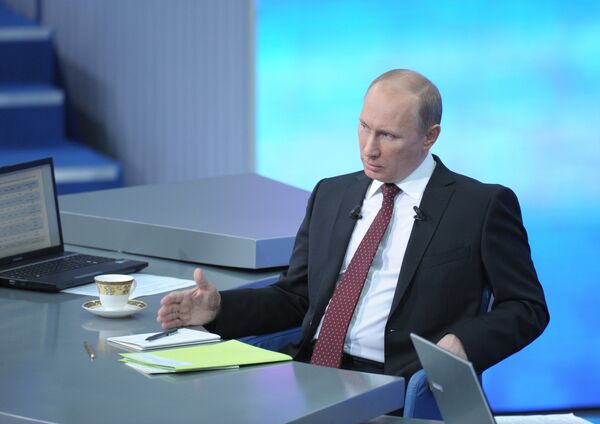 Premier ministre Vladimir Poutine lors d'une séance annuelle de questions-réponses avec la population - Sputnik Afrique