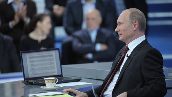 Premier ministre Vladimir Poutine lors d'une séance annuelle de questions-réponses avec la population - Sputnik Afrique