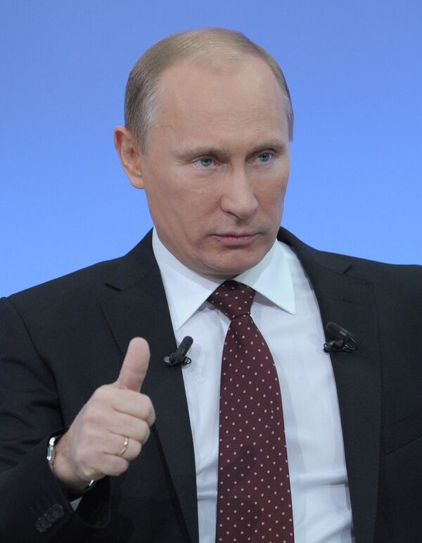 Premier ministre russe Vladimir Poutine lors d'une séance annuelle de questions-réponses avec la population - Sputnik Afrique