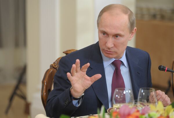 Le premier ministre russe Vladimir Poutine lors d'une rencontre avec les rédacteurs en chef des médias russes - Sputnik Afrique