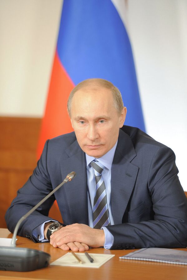 Premier ministre et candidat à la présidence de la Russie Vladimir Poutine - Sputnik Afrique