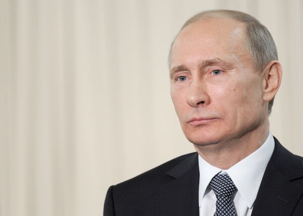 Le premier ministre et candidat à la présidentielle de mars, Vladimir Poutine - Sputnik Afrique