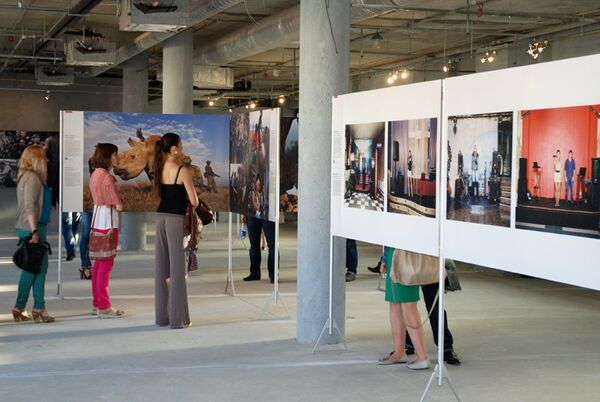 Exposition du concours World Press Photo 2012 à Moscou - Sputnik Afrique