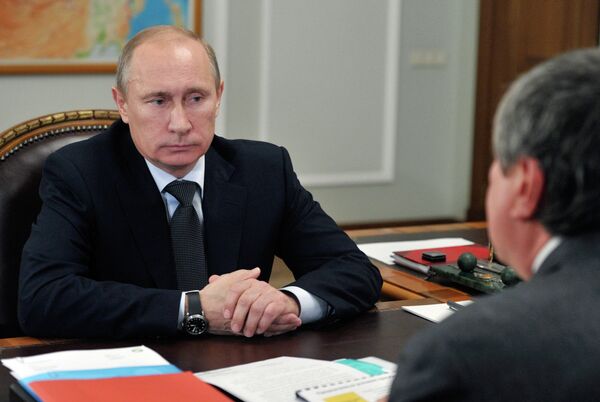 Président russe Vladimir Poutine lors d'une rencontre avec le PDG de Rosnef Igor Setchine - Sputnik Afrique