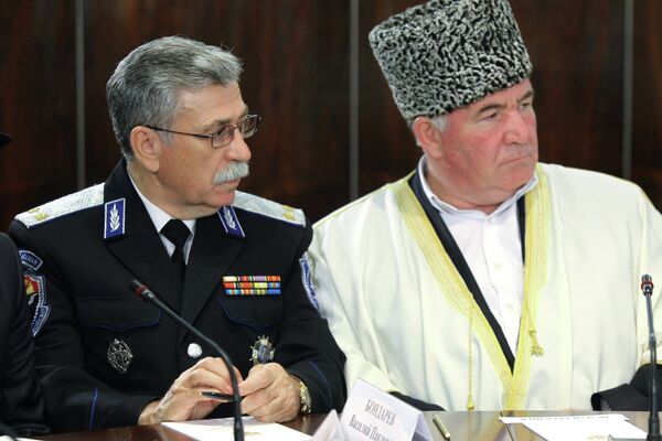 Le président du centre de coordination des musulmans du Caucase russe, le mufti Ismaïl Berdiev à droite) - Sputnik Afrique