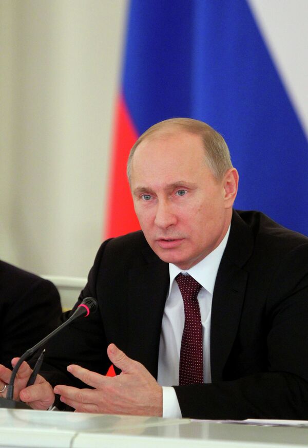 Poutine promet de signer la loi anti-Magnitski - Sputnik Afrique