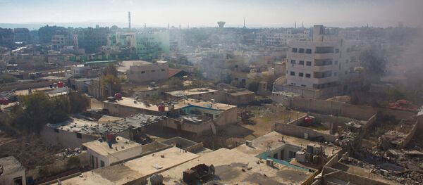 Вид на территорию, занятую боевиками Свободной армии Сирии, в городе Дарайя - Sputnik Afrique