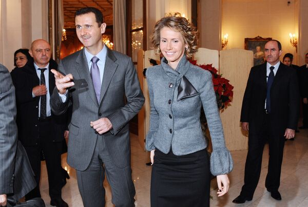 Président syrien Bachar el-Assad et son épouse Asma - Sputnik Afrique