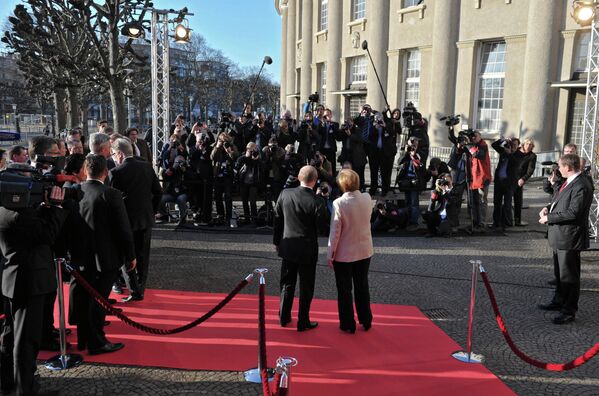 Poutine et Merkel à l'inauguration de la Foire de Hanovre - Sputnik Afrique