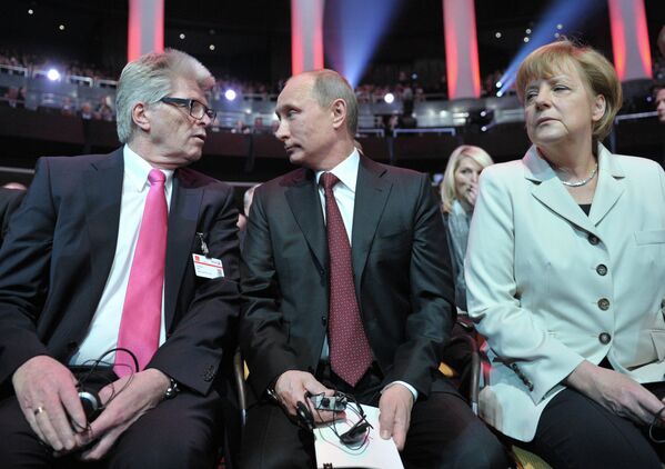 Poutine et Merkel à l'inauguration de la Foire de Hanovre - Sputnik Afrique