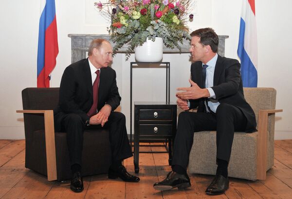 Président russe Vladimir Poutine et le premier ministre néerlandais Mark Rutte - Sputnik Afrique