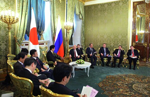 Poutine invité à Tokyo en 2014 par le premier ministre nippon - Sputnik Afrique