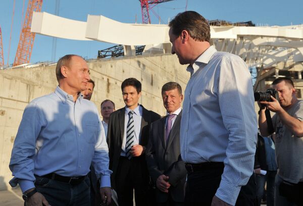 JO de Sotchi: Poutine et Cameron visitent le stade olympique - Sputnik Afrique