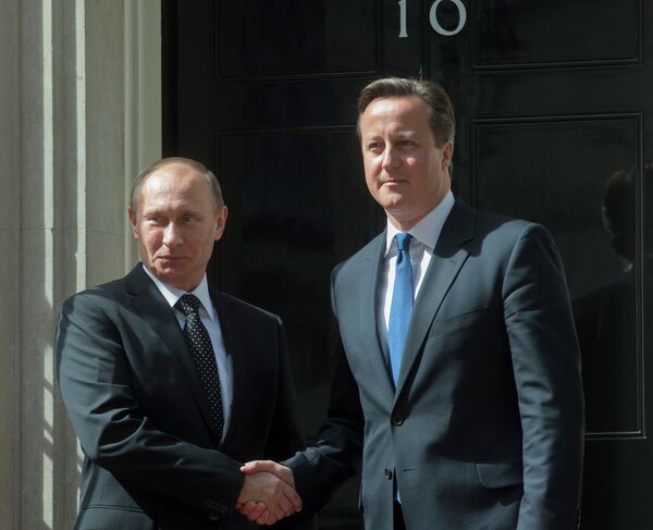 Le président russe Vladimir Poutine et le premier ministre britannique David Cameron (archives) - Sputnik Afrique