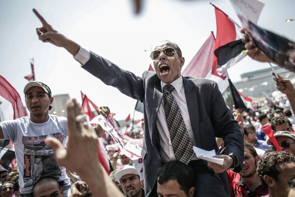 Action de protestation contre la politique du président égyptien Mohamed Morsi en Caire - Sputnik Afrique