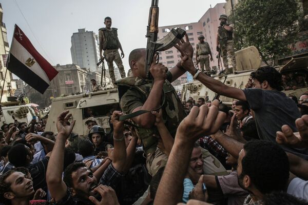 Egypte: un photographe de RIA Novosti agressé au Caire - Sputnik Afrique