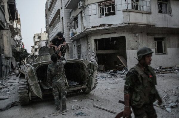 Syrie: Homs reprise par les troupes gouvernementales - Sputnik Afrique