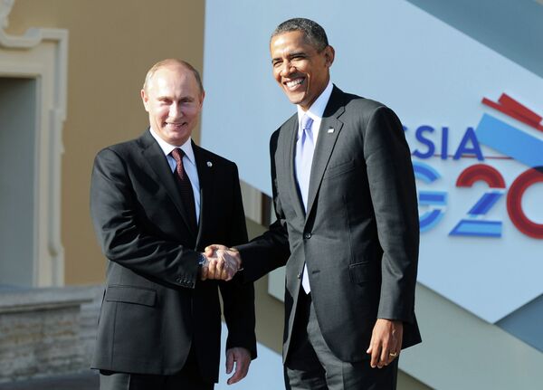 Le président russe Vladimir Poutine avec son homologue américain Barack Obama - Sputnik Afrique