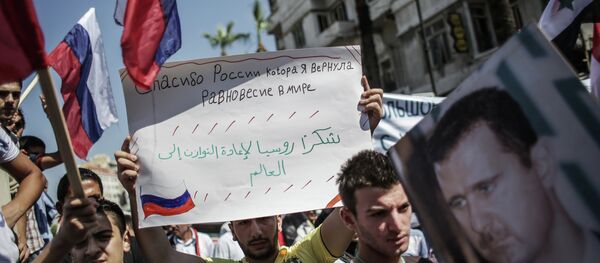 Un meeting de soutien à la Russie et au gouvernement syrien à Lattaquié Un meeting de soutien à la Russie et au gouvernement syrien à Lattaquié - Sputnik Afrique