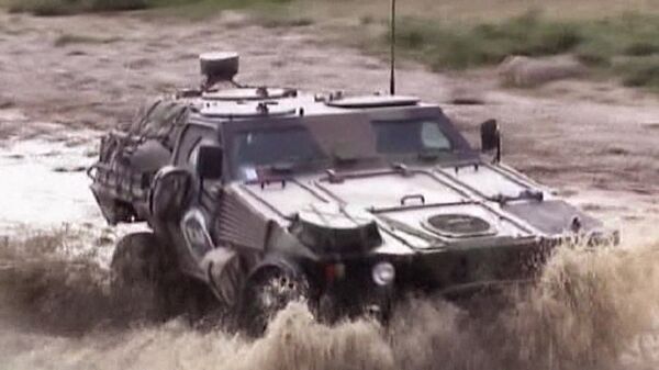 Un véhicule blindé léger au salon Russia Arms Expo-2013 - Sputnik Afrique
