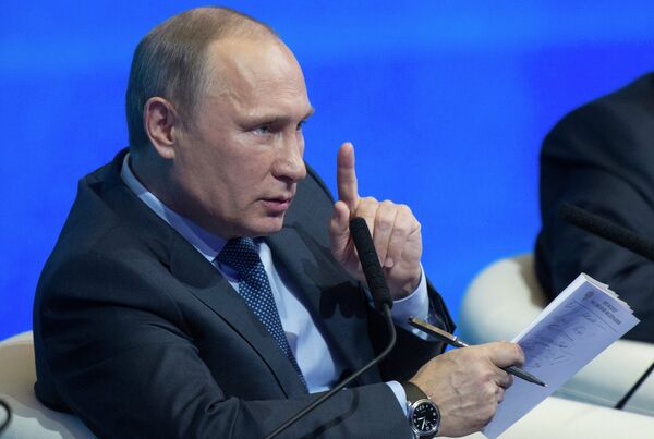 Le président russe Vladimir Poutine lors d'une conférence du Front populaire panrusse - Sputnik Afrique