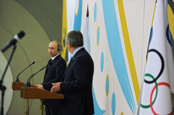 Le président russe Vladimir Poutine lors d'un petit-déjeuner officiel offert par le COI - Sputnik Afrique