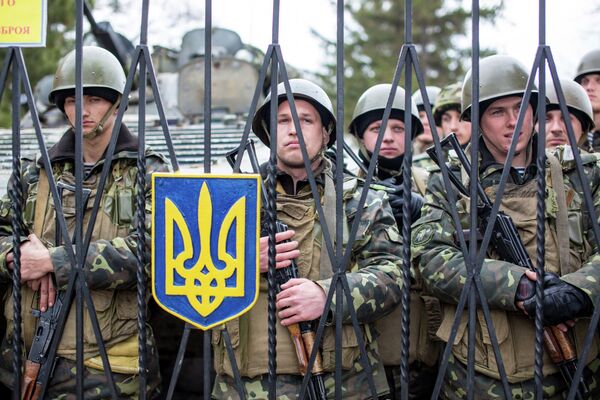 Crimée: Poutine remercie les militaires ukrainiens pour leur retenue - Sputnik Afrique