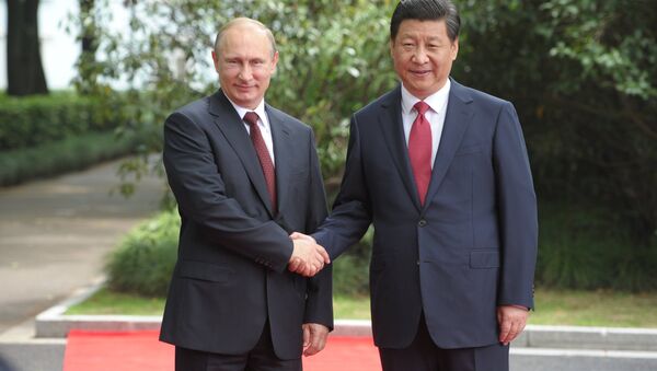 Le président russe Vladimir Poutine et son homologue chinois Xi Jinping - Sputnik Afrique