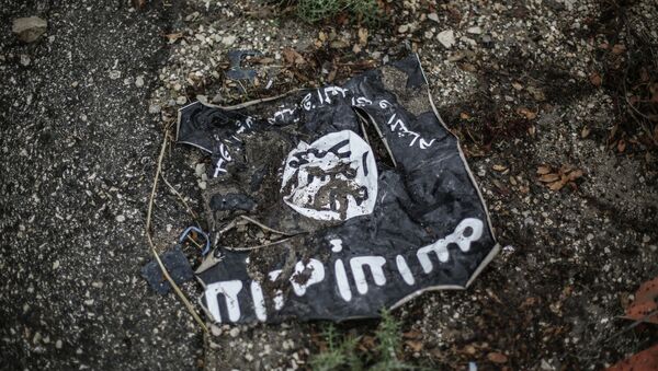 Флаг радикальной исламистской организации Исламское государство Ирака и Леванта - Sputnik Afrique
