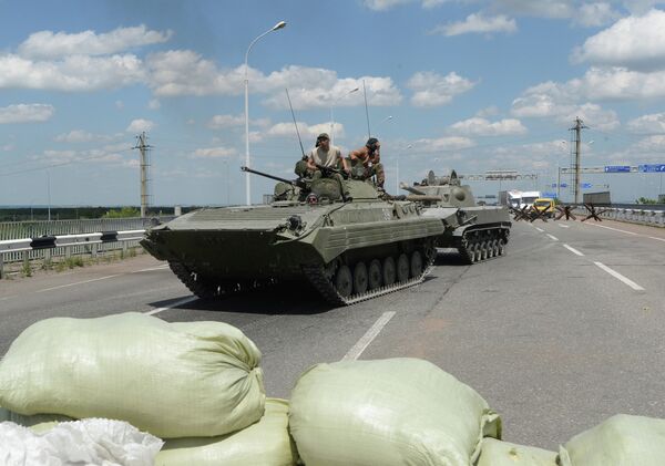 Combattants des forces d'autodéfense à Donetsk - Sputnik Afrique
